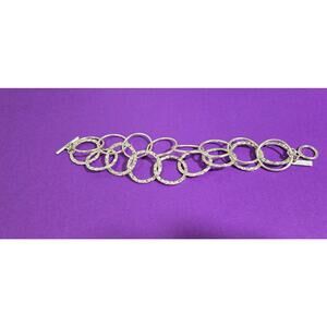 Daisy Fuentes silver tone 7'' rings bracelet  1.1675